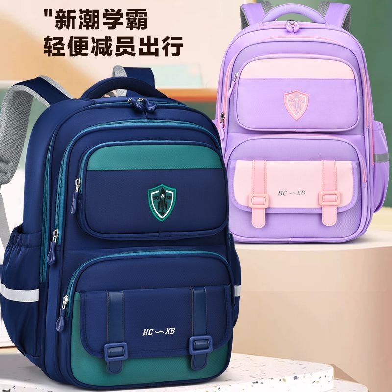 藏青撞绿学院风小学生书包轻量化护脊防泼水大容量男女儿童双肩包