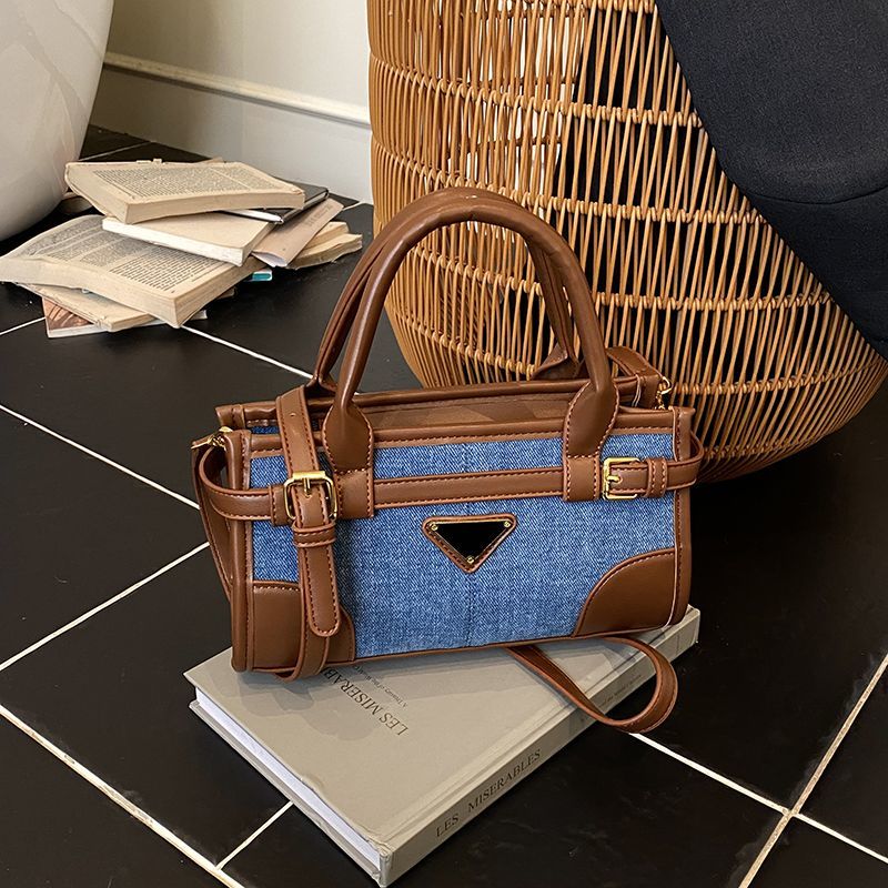 高级感牛仔拼接保龄球包新款女大容量手提斜挎包通勤单肩包