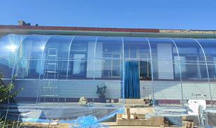 农村阳光棚房前暖棚半坡暖棚冬季温室防水保温花棚简易阳光房