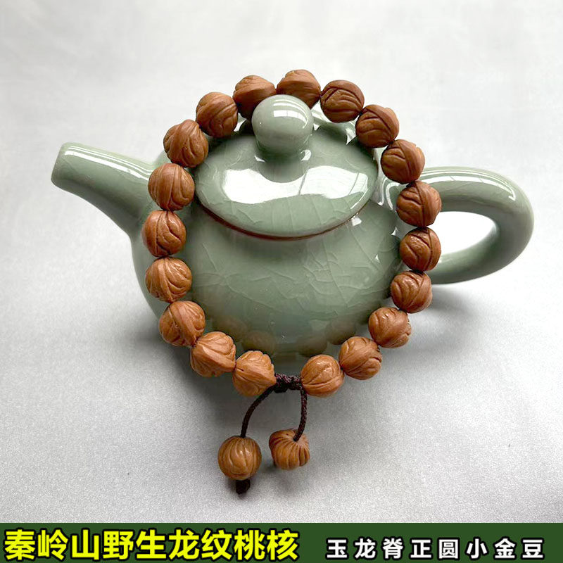 野生小龙纹桃核手串天然玉龙脊