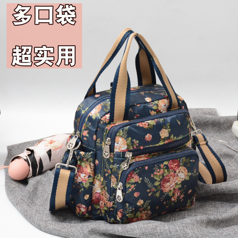 女士通勤斜挎包多口袋妈妈包布包