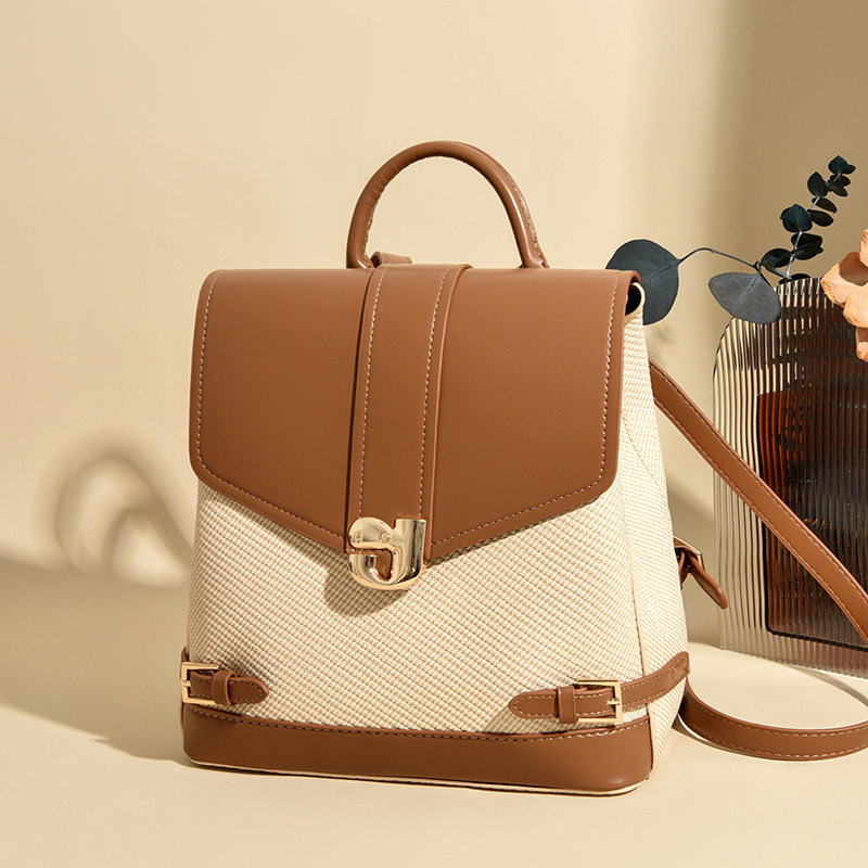 高级感真皮双肩包女2025新款牛皮大容量撞色学生包百搭旅游小背包