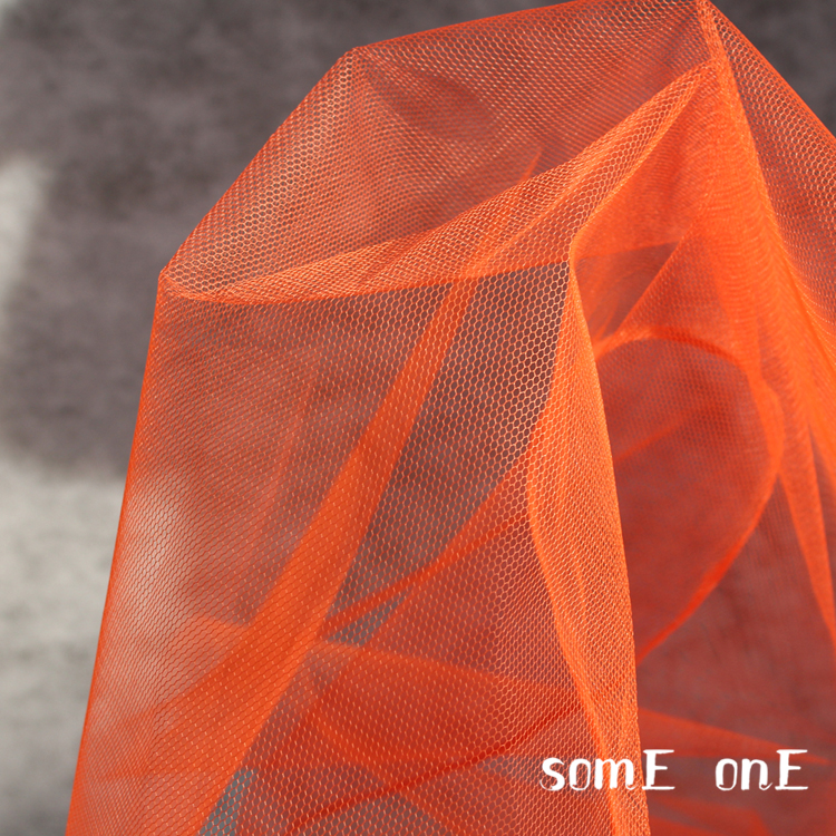 镂空橘红色网眼服装设计师布料