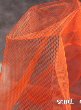 镂空透视硬质正六角网纱橘红色网眼网纱面料服装设计师创意布料
