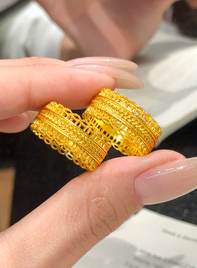 镀黄金色镂空花丝腰缠万贯戒指