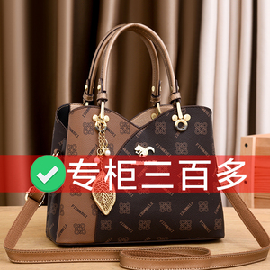 真皮质感女包印花手提包