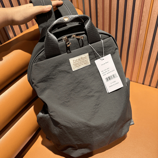 专柜正品双肩包女轻便学生书包防水背包学生旅行包通勤上班包包男