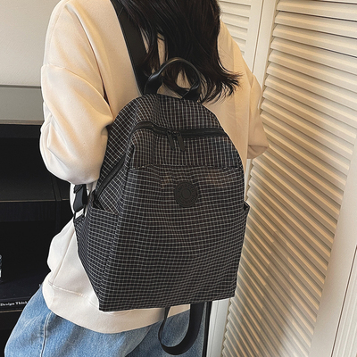 高颜值格子日系双肩包女2025新款轻便大容量旅游通勤背包学生书包