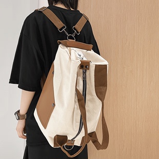 多功能简约旅行包休闲帆布双肩斜挎背包实用结实手提袋轻便行李包