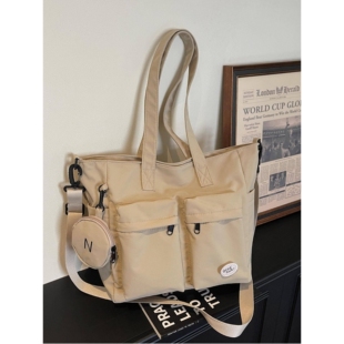 专柜品牌跨境帆布包女士2026新款日系通勤单肩包大容量手提斜挎托