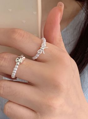 包邮甜美仿珍珠串珠戒指女手作弹力可爱小狗蝴蝶结指环百搭叠戴食