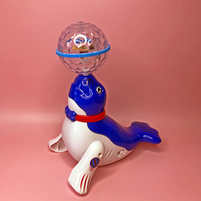 海狮顶球旋转电动发光带音乐小狗狗仿真走路跳舞1-2-3岁儿童玩具