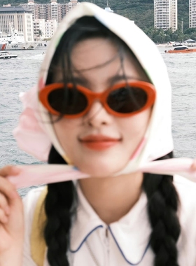 复古猫眼橘红色墨镜海边度假女