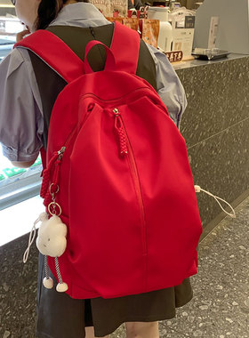 红色书包女大学生大容量休闲旅行电脑背包韩版高中简约纯色双肩包