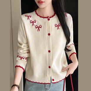 佐梦依蝴蝶结开衫毛衣 麻花毛衣