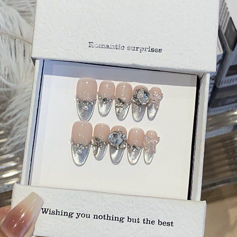 美甲冰透蓝色侧光法式猫眼碎钻