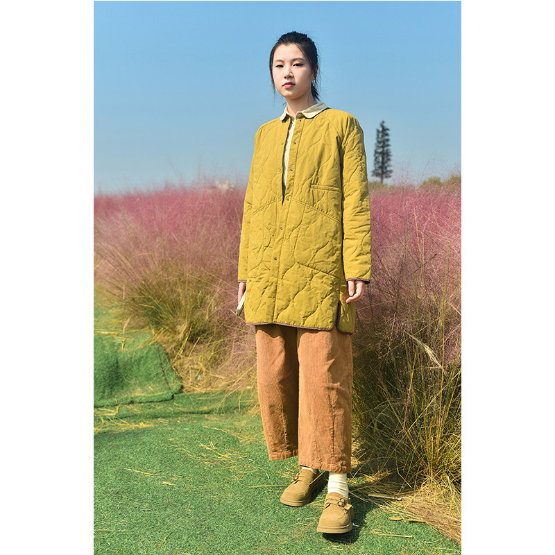 聚酯纤维中长文艺宽松压花棉衣