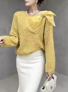 慵懒风紫色蝴蝶结针织衫女秋冬软糯宽松显瘦高级感毛衣一字领上衣