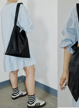 载迟2024秋新 环保耐磨PU长期主义极简单肩包 无性别小众黑色挎包