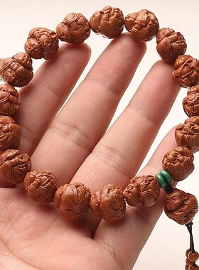野生秦岭龙纹桃核手串