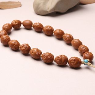 手工橄榄核雕刻小籽可爱铁核豆丁大头弥勒佛橄榄胡手串十小佛手持
