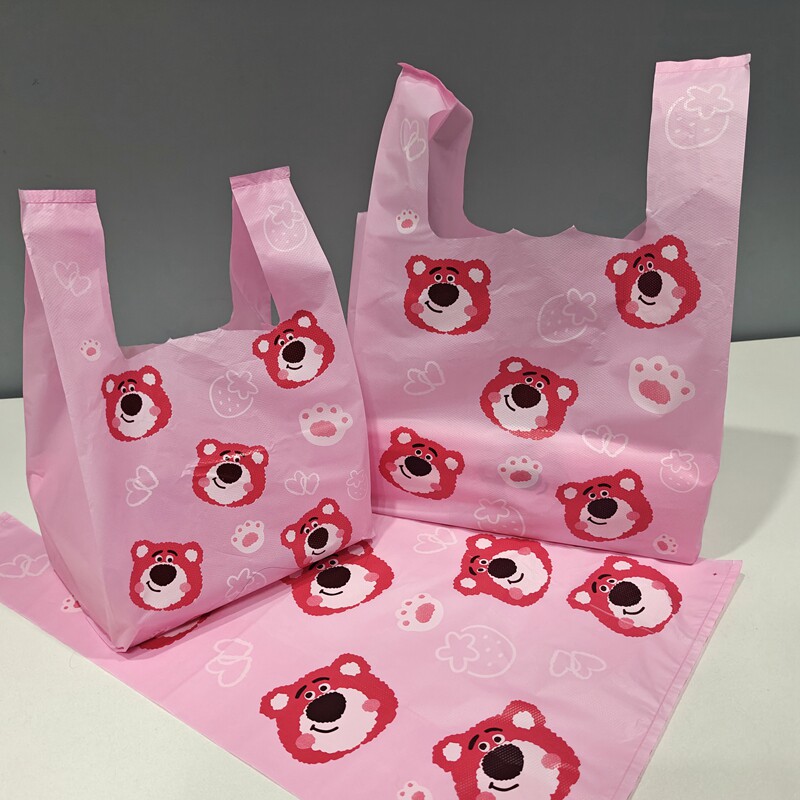 粉红草莓熊创意个性塑料背心袋外卖打包袋玩具文具礼品手提袋胶袋图片