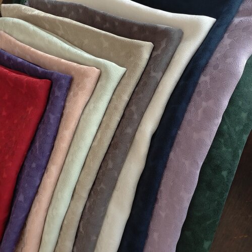 重磅砂洗铜氨丝点点满盘提花面料