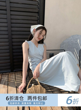 你好卡农 交叉叠搭盘扣连衣裙女夏季2024年新款设计感收腰a字长裙