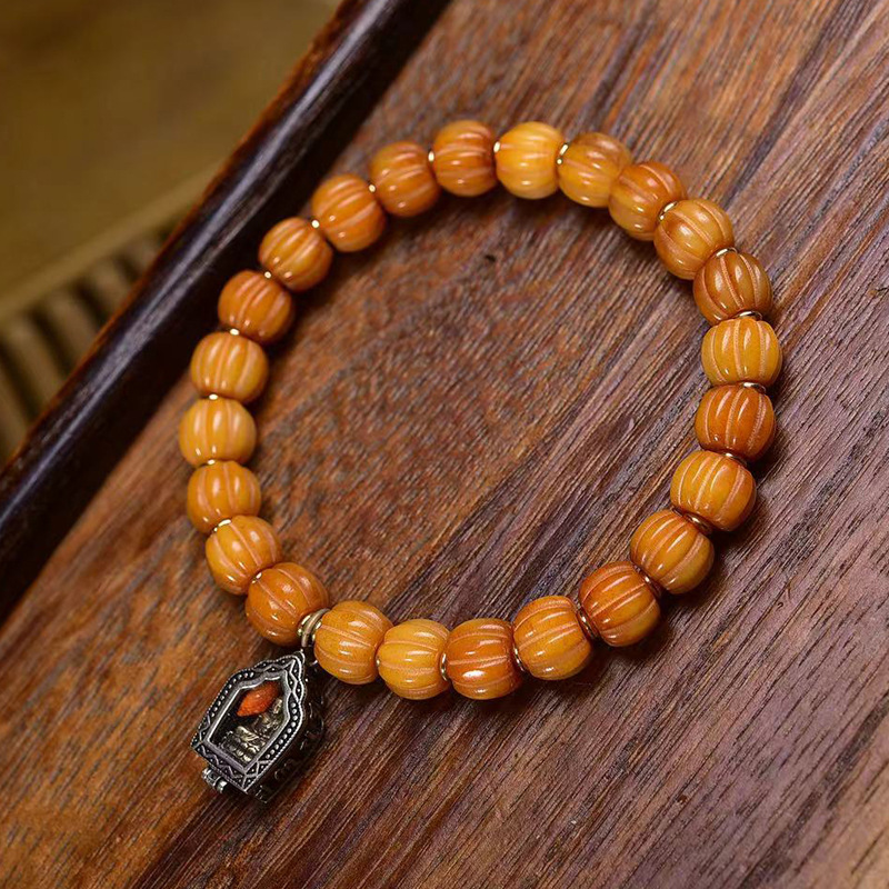 藏传回流骨雕刻南瓜珠文玩手串