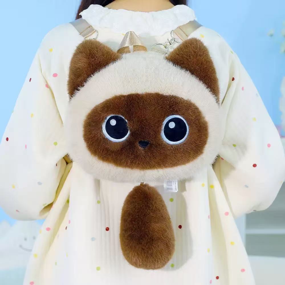 可爱三花猫咪玩偶背包可抽拉尾巴黑猫公仔双肩包毛绒女生出游礼物图片