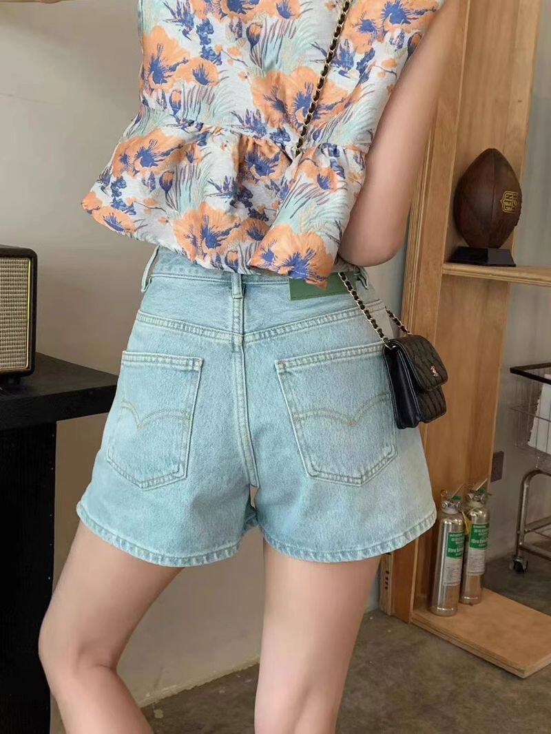 韩版高腰牛仔短裤女2025夏季新款阔腿裤浅蓝色显瘦开叉A字热裤潮