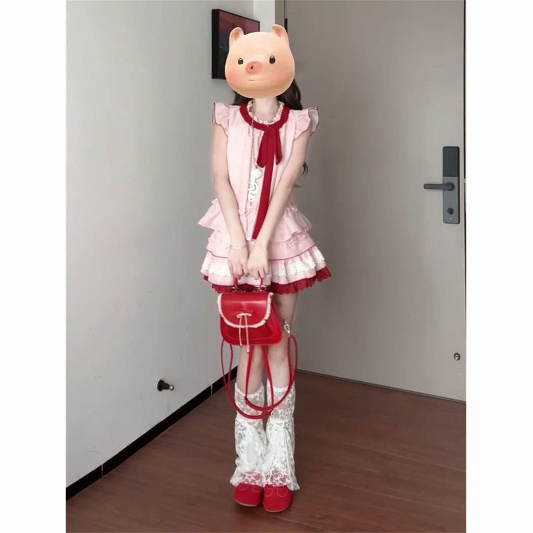 蝴蝶结上衣+蛋糕半身裙