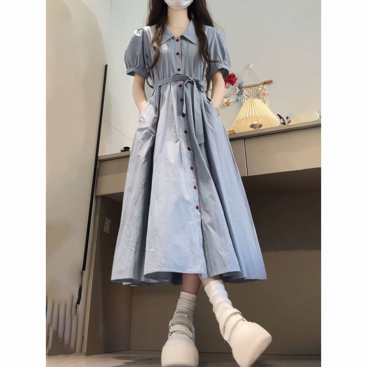 单排扣蓝色绑带连衣裙
