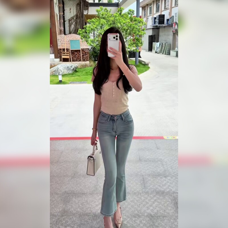 浅蓝色九分微喇牛仔裤女2026春季新款掐腰提臀显瘦喇叭裤