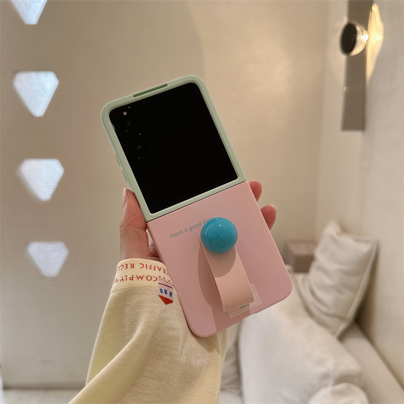 粉绿撞色笑脸指环扣折叠屏手机壳