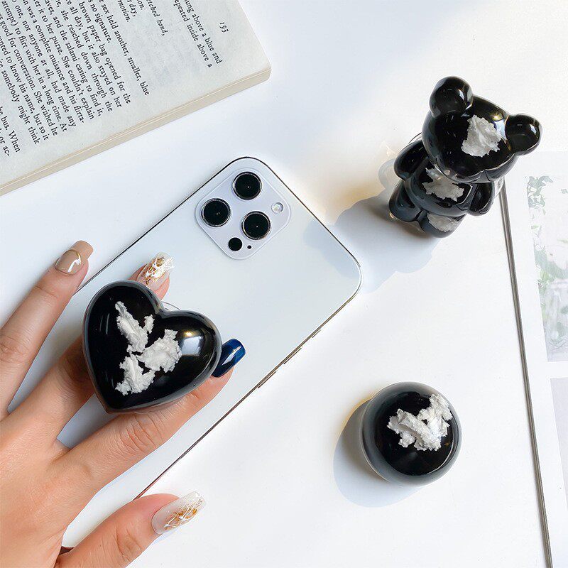 手机气囊支架黑色小熊云朵爱心粘贴式可伸缩小众气垫囊支撑背贴架