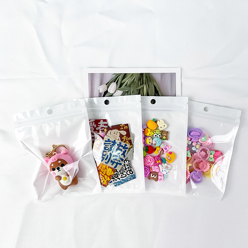 白色珠光膜阴阳挂耳机自封袋透明孔饰品拉骨密封塑料包装袋10新款