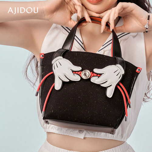 阿吉豆手提斜挎包时尚休闲潮趣