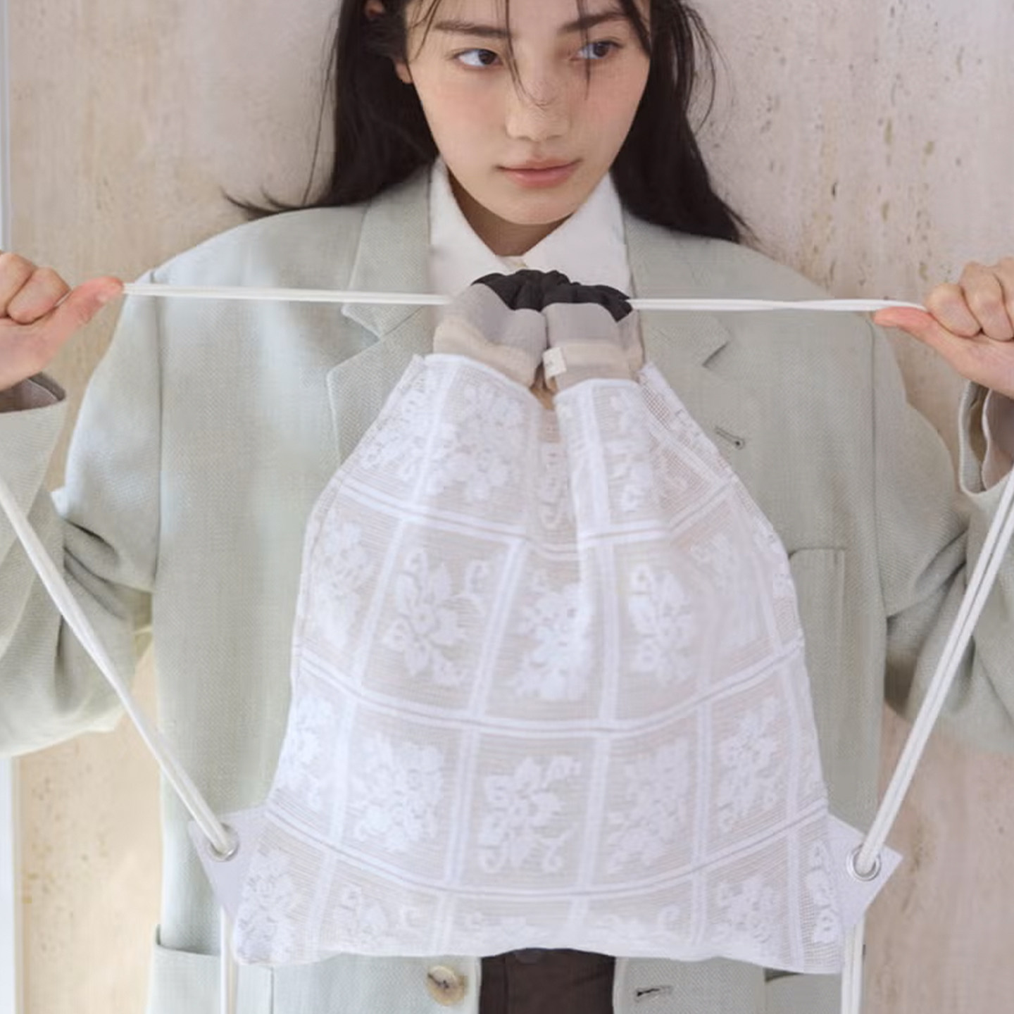 casselini26年新款小众白色蕾丝抽绳双肩包印花日常通勤休闲女包