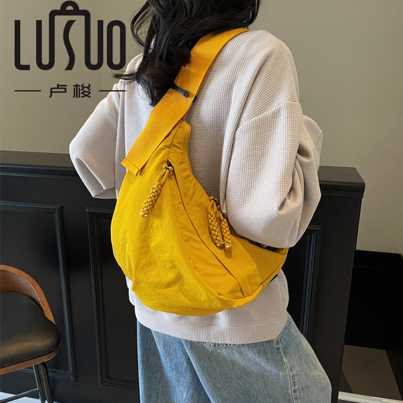 正品潮牌官方饺子包女斜挎新款背包男士包包运动男女士休闲胸包骑