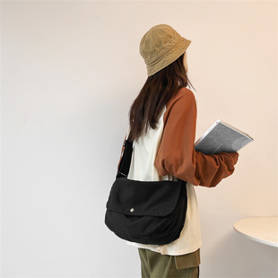 大容量休闲帆布包翻盖单肩包日系简约复古单肩包学生背包男女同款