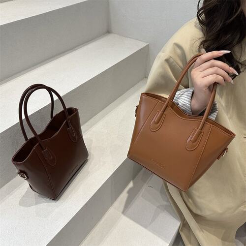 韩系小众设计简约休闲手提包包女2025秋季新款时尚百搭斜挎水桶包