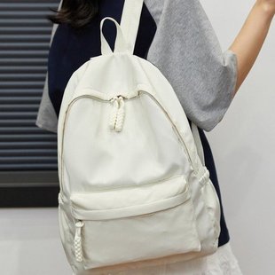书包女生简约休闲纯色背包小学初中高中大学生韩版原宿百搭双肩包