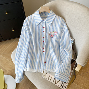 蓝色衬衣温柔小众设计感蕾丝口袋春季长袖衬衫2025新款别致上衣女