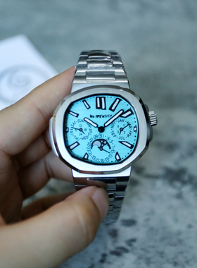 No identity恶搞鹦鹉螺异形壳手绘盘面自动机械表蓝色钢带版