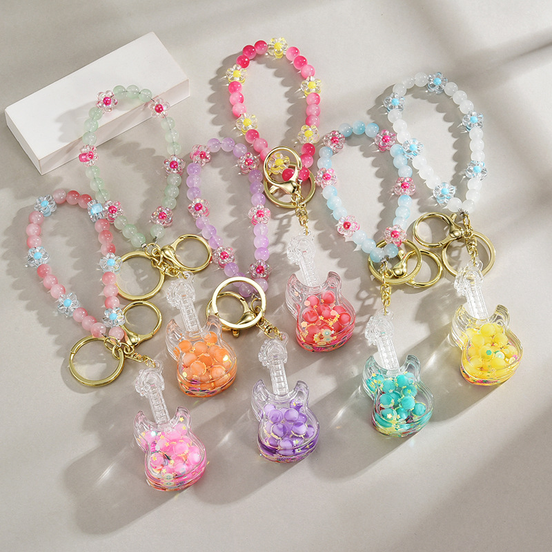 亚克力入油流沙瓶夜光钥匙扣创意手工串珠手机链挂件包挂饰小提琴