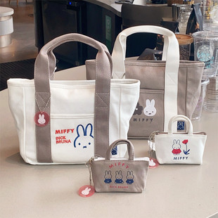 日系卡通米飞兔刺绣帆布手提包通勤手拎便当包可爱耳机零钱小挂包