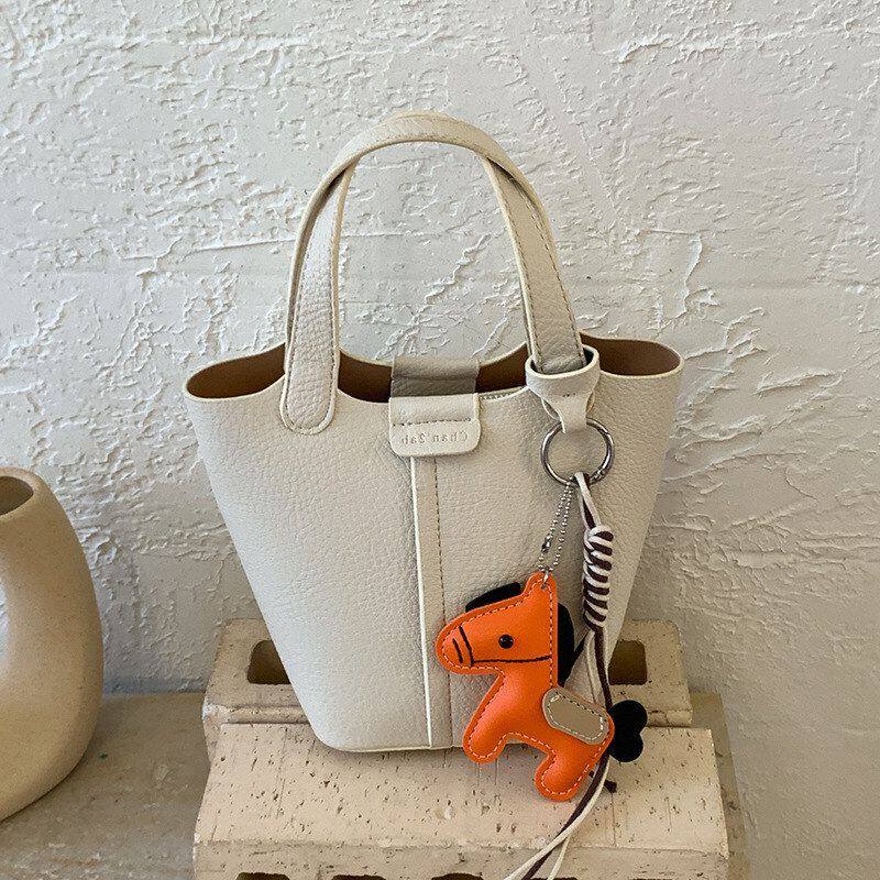 洋气拎包新款超火小时尚百搭迷你斜挎包高级感2026水桶包精致手提