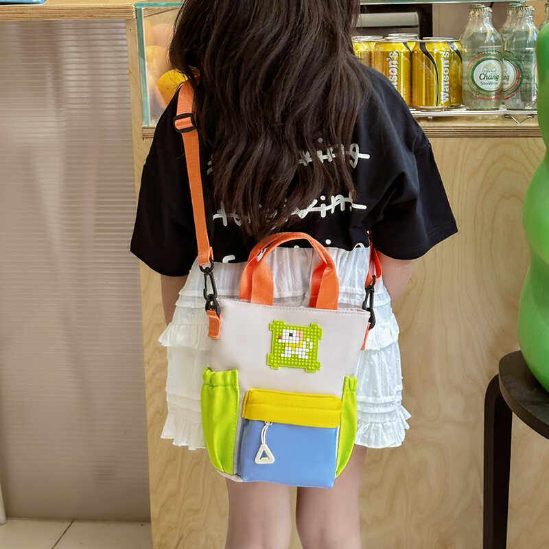 儿童小包包女2025新款流行可爱学生手提卡通女童包ins单肩斜挎包
