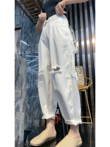 白色宽松显瘦破洞哈伦九分牛仔裤